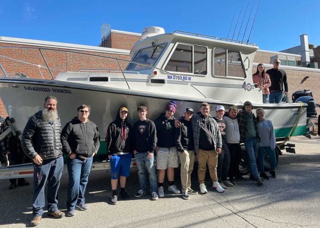 Students in the HVAC, Precision Machining, Automotive, Photography, Advanced Manufacturing and Engineering pathways check out a boat produced by Eastern Boats, of Milton as company representatives visit the R.W. Creteau Technology Center on Oct. 29 to discuss possible work-based learning opportunities and what a career in the boat building trade could look like.